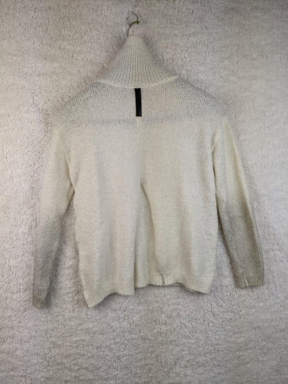 Back view of cream high neck sweater