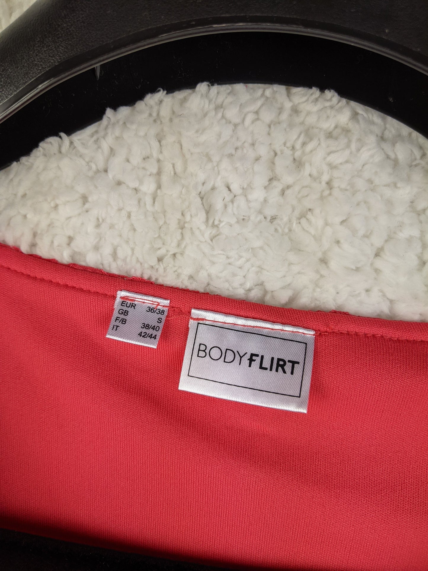 Clothing label of Body Flirt red lace dress