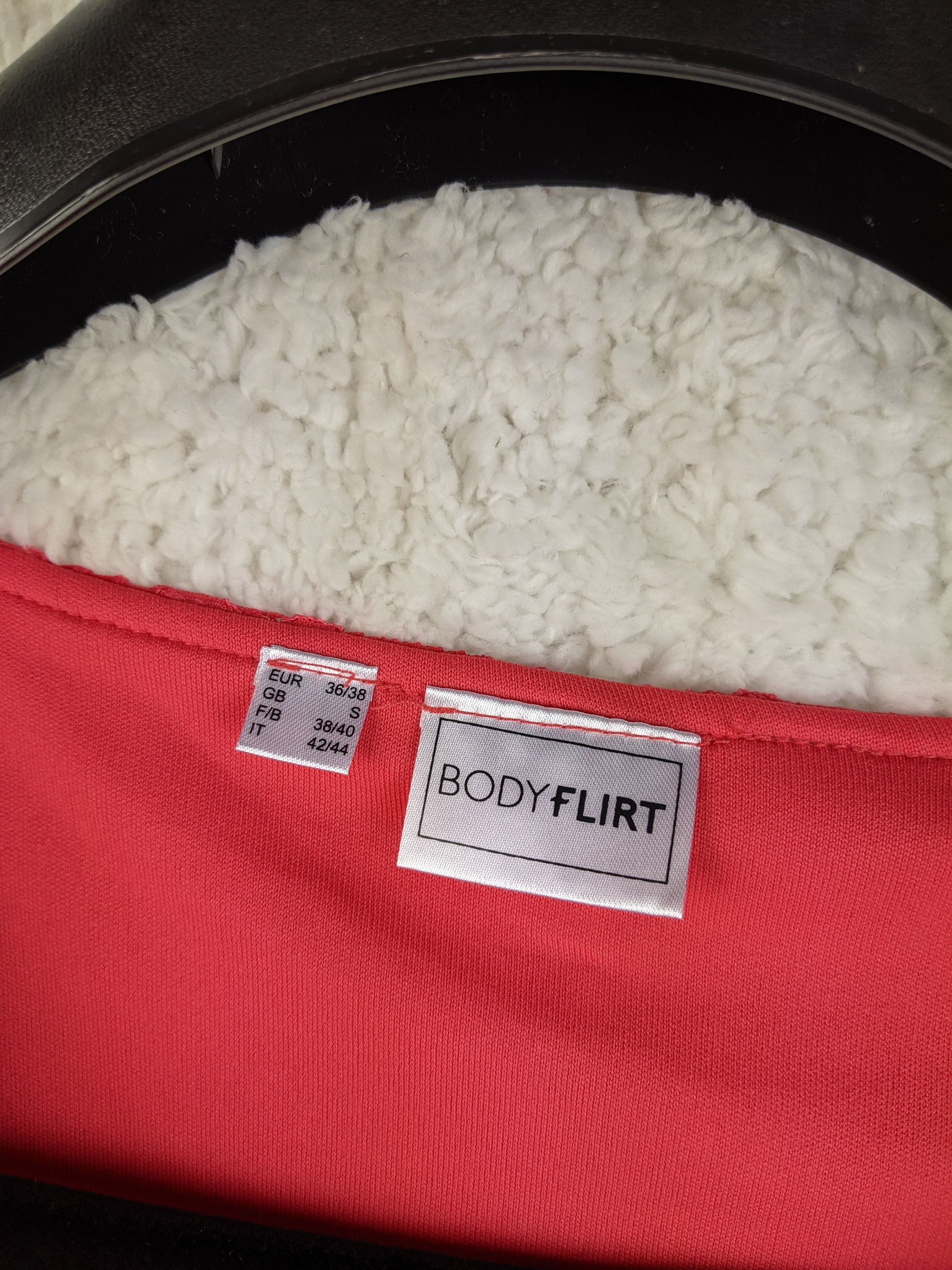 Clothing label of Body Flirt red lace dress