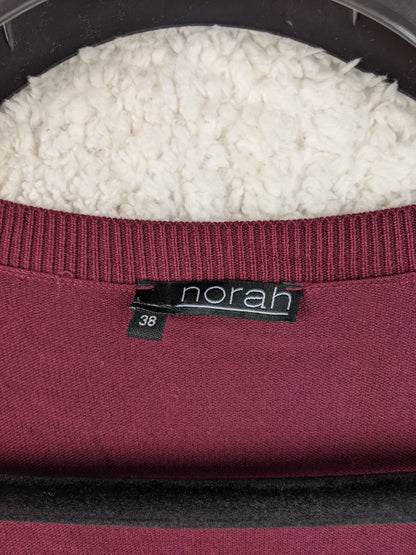 Brand label of Norah burgundy long cardigan