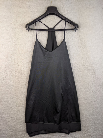 Front view of black slip dress on hanger