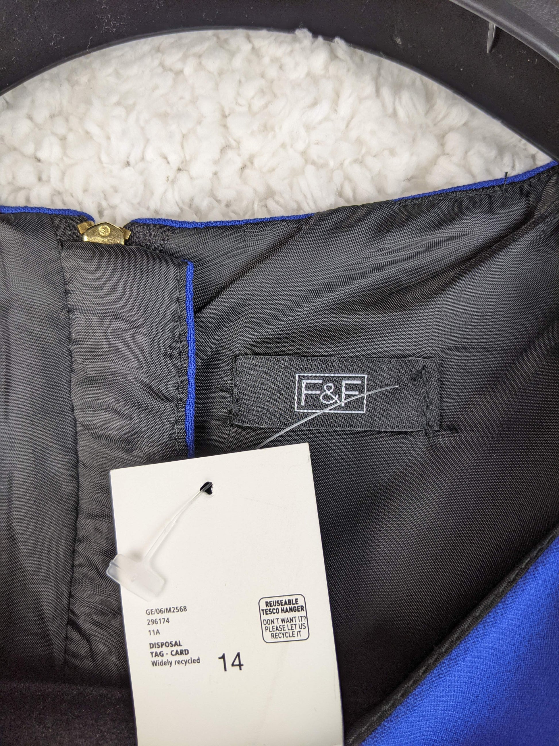 Close-up of F&F dress tag showing size 14