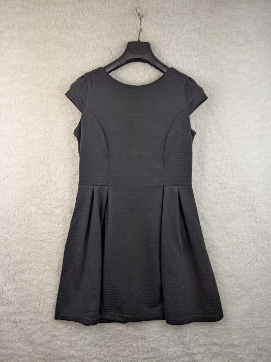 Front view of black dress on hanger