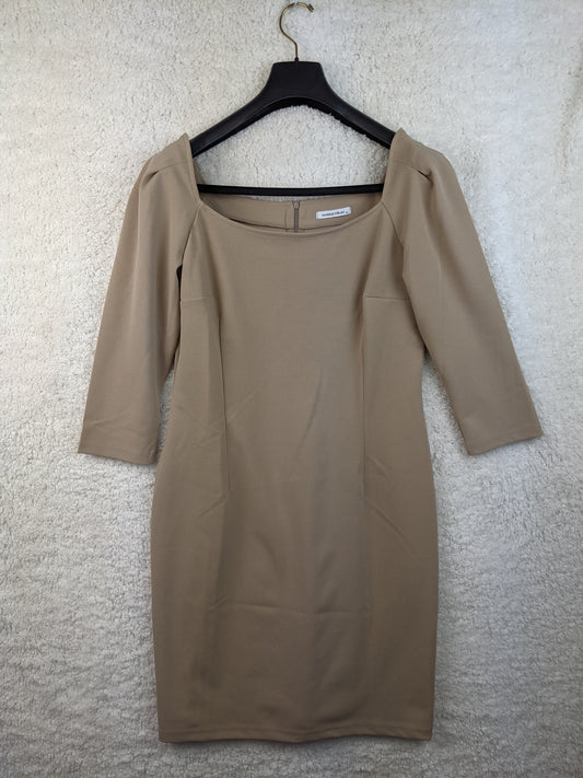 Front view of Angelle Milan beige bodycon dress
