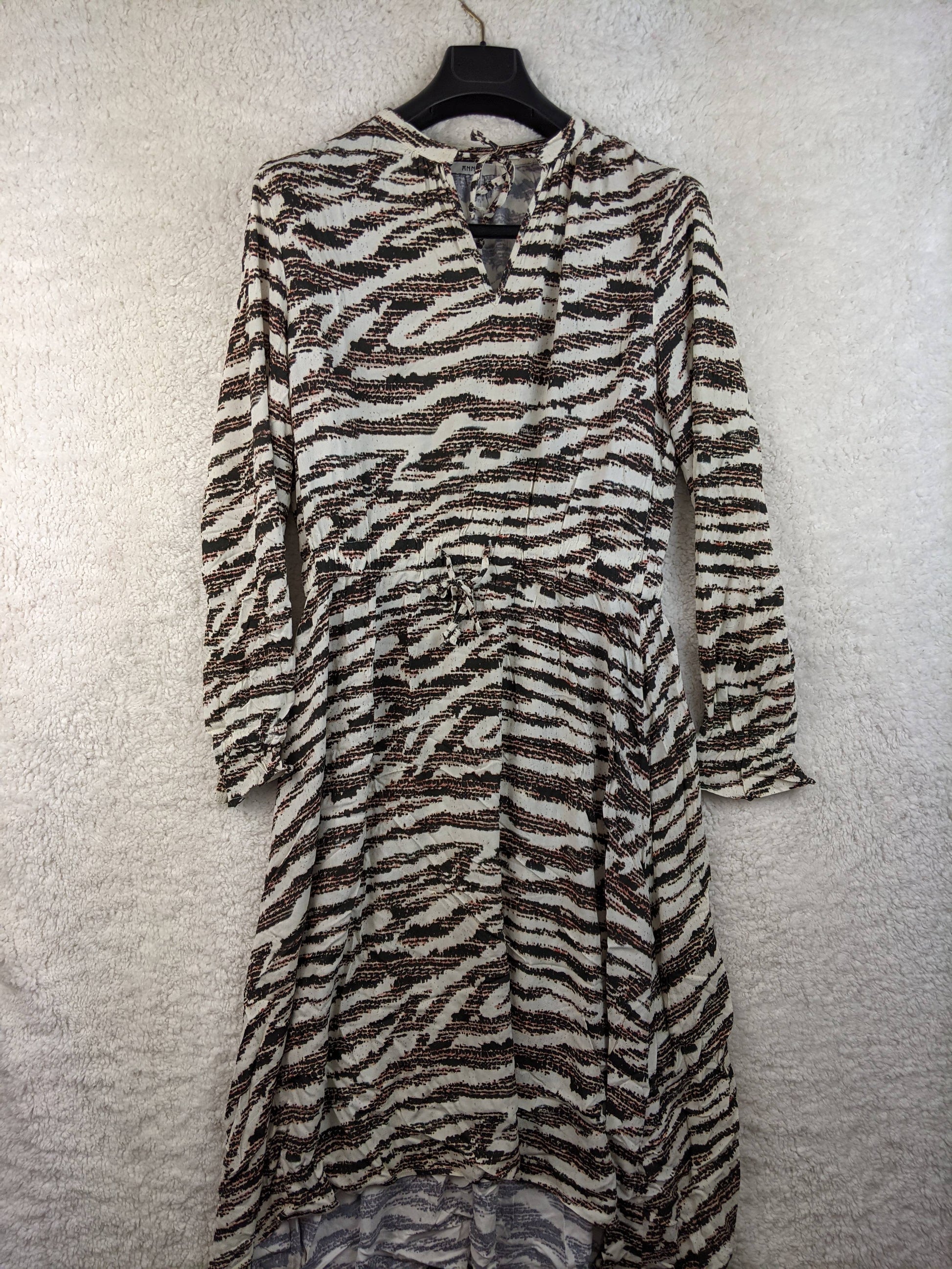 Front view of Anna zebra-print wrap dress