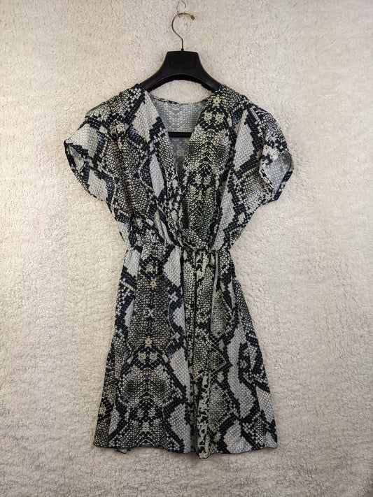 Front view of snakeskin print wrap dress