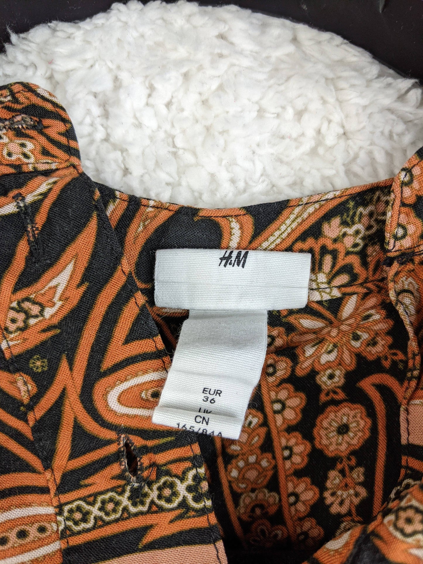 H&M label showing size and brand