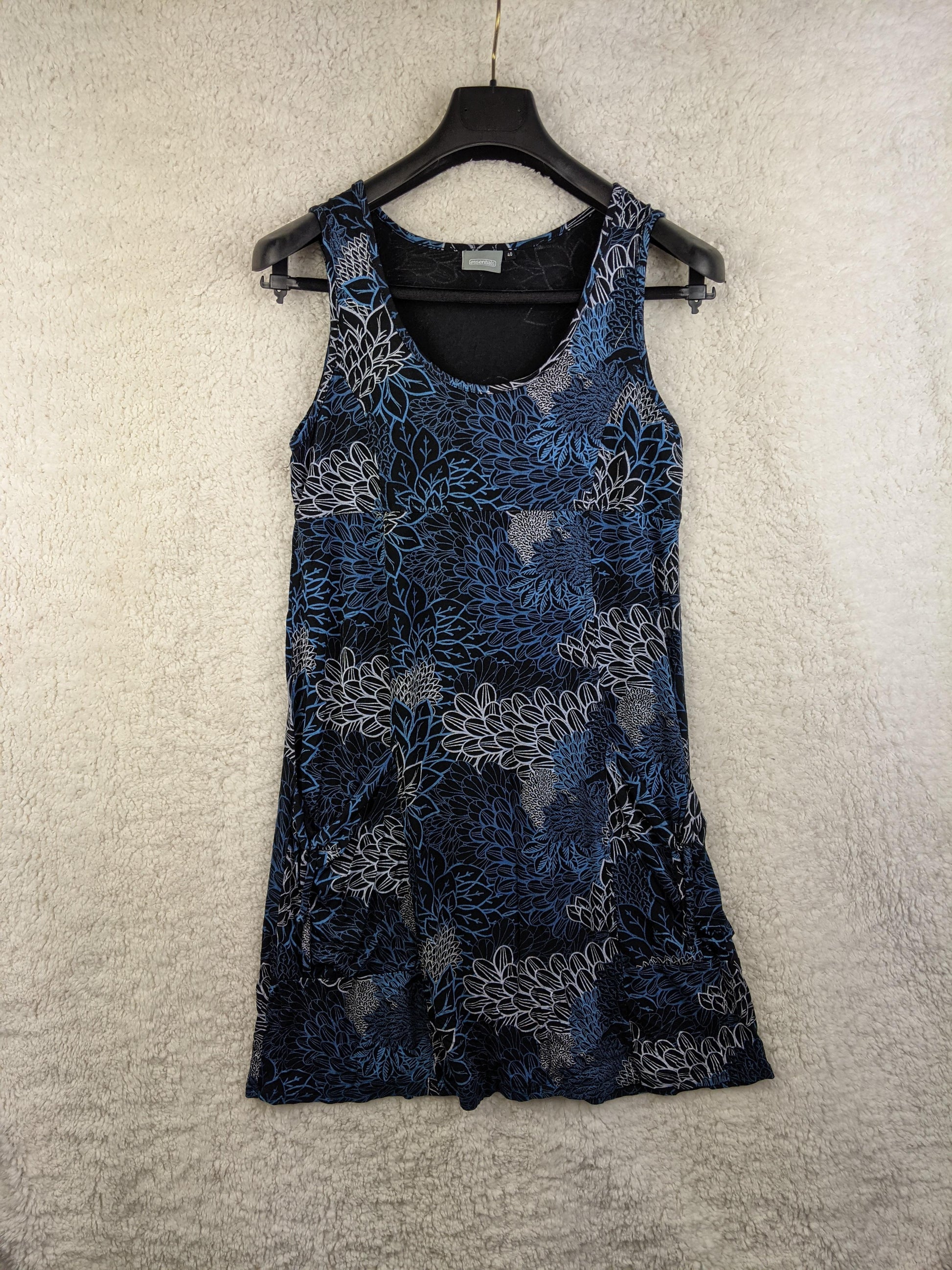 Front view of blue floral sleeveless dress