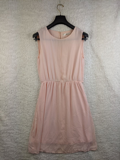 Front view of light pink sleeveless dress
