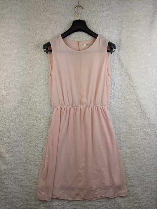 Front view of light pink sleeveless dress