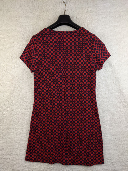 Back view of red and black patterned dress