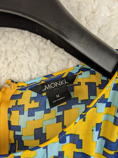 Close-up of Monki dress label