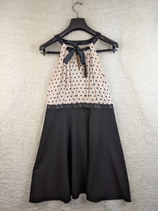 Front view of Steps polka dot halter dress