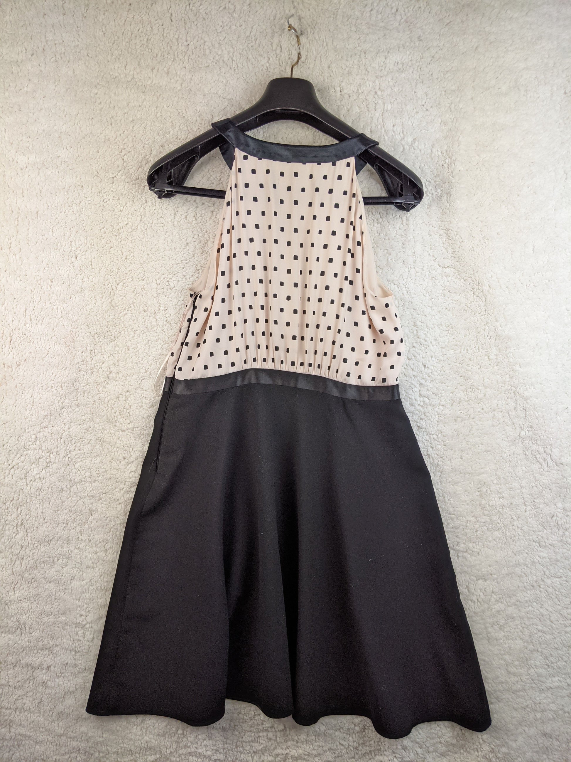 Back view of Steps polka dot halter dress