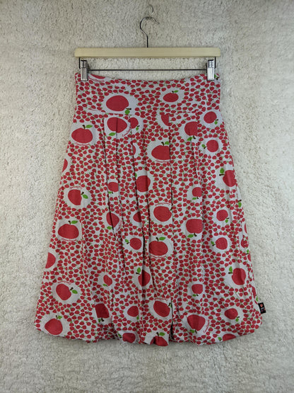 Front view of KanaBeach apple print skirt