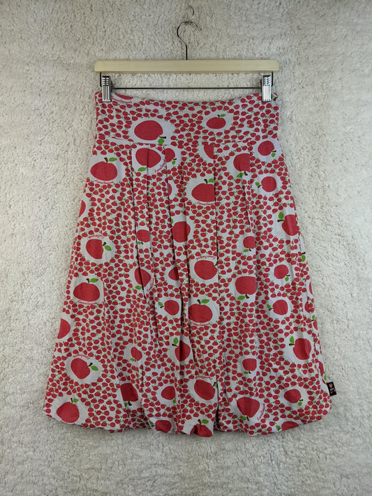 Front view of KanaBeach apple print skirt