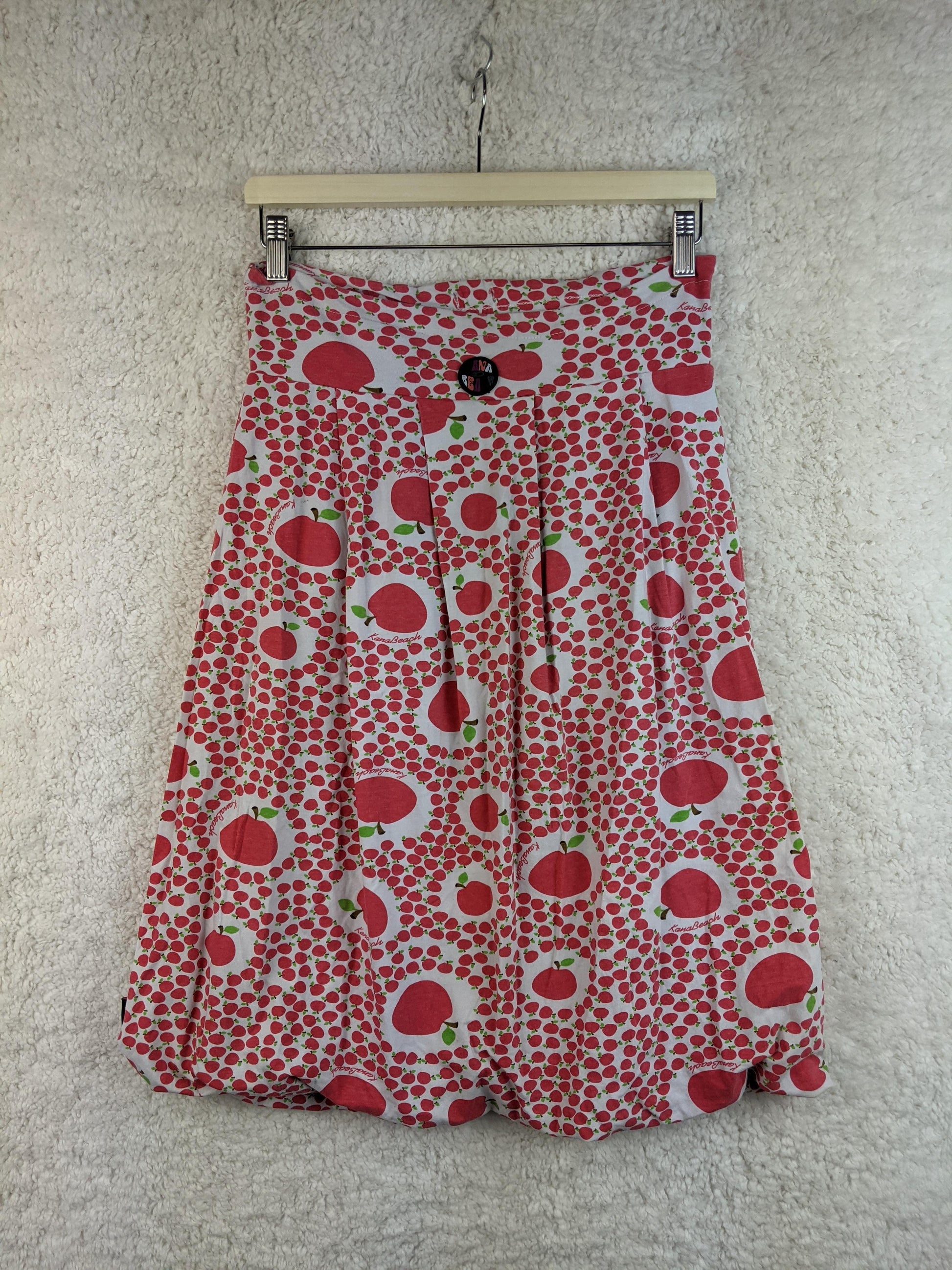 Back view of KanaBeach apple print skirt