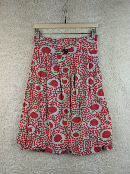 Back view of KanaBeach apple print skirt