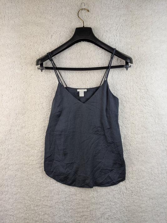 Black spaghetti strap top on hanger, front view