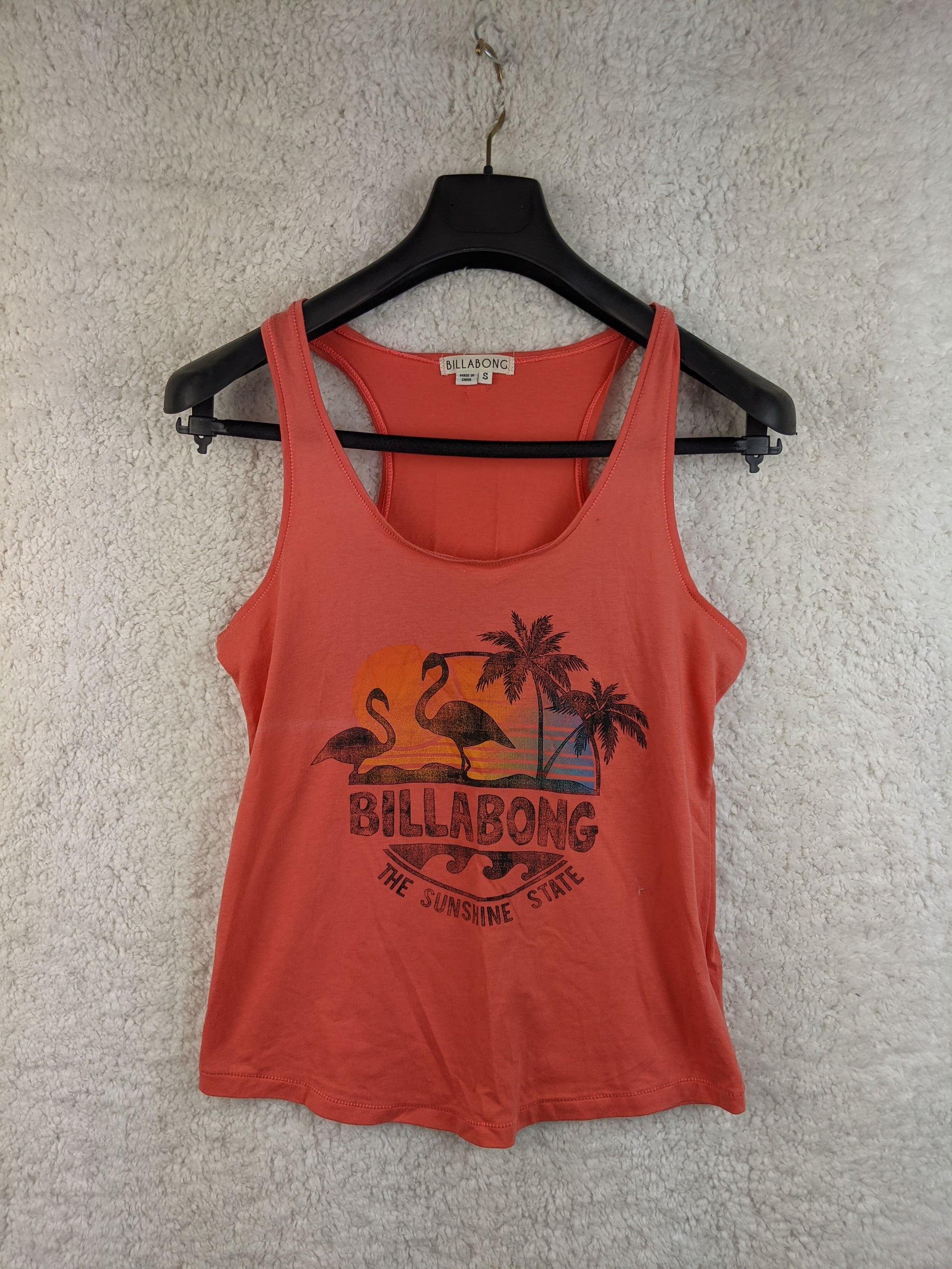 Front view of Billabong red tank top