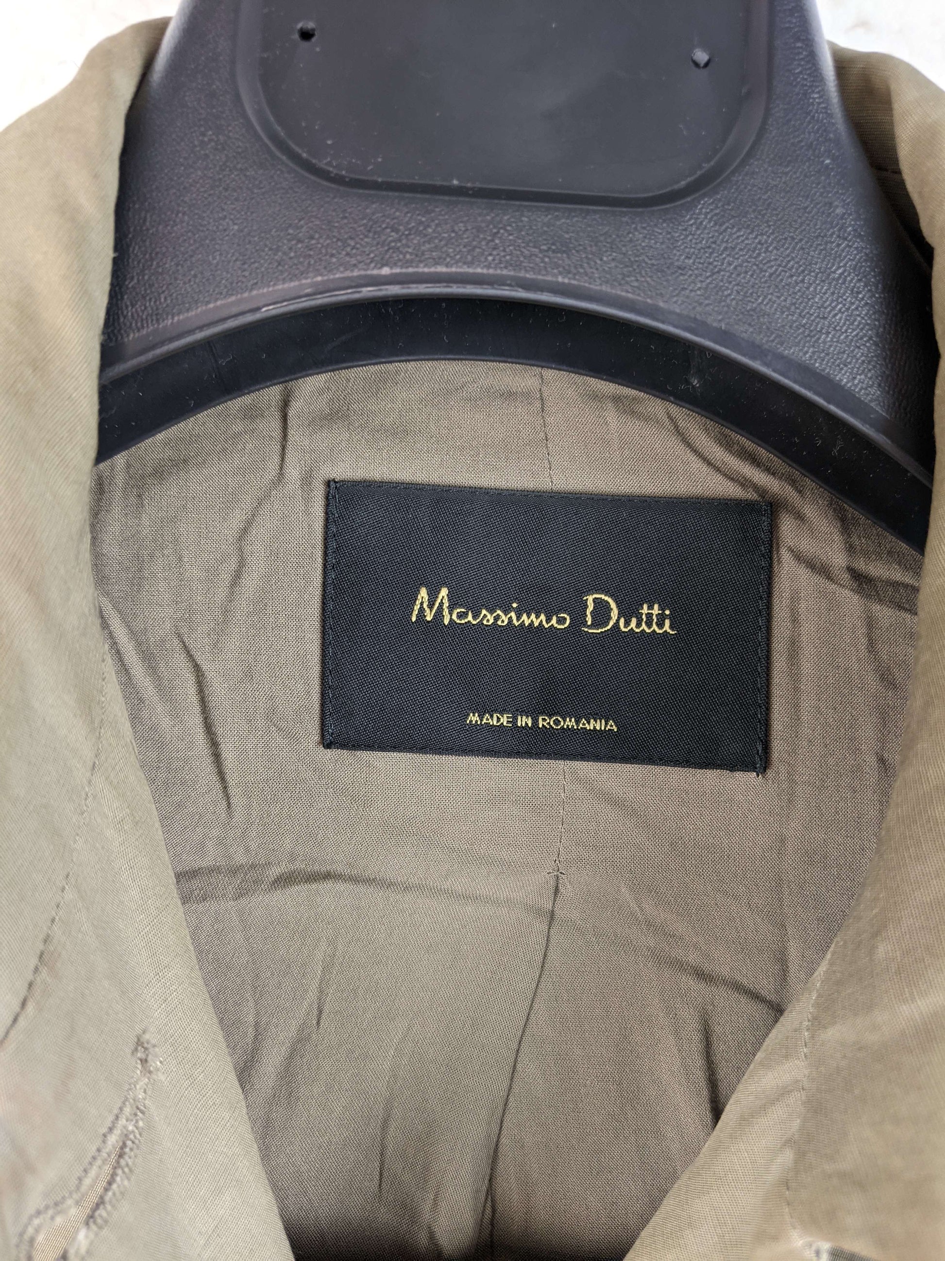 Close-up of Massimo Dutti label inside jacket