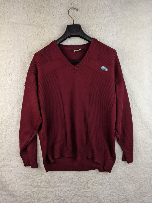 Burgundy V-neck sweater on a hanger