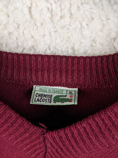 Close-up of Lacoste label on the sweater