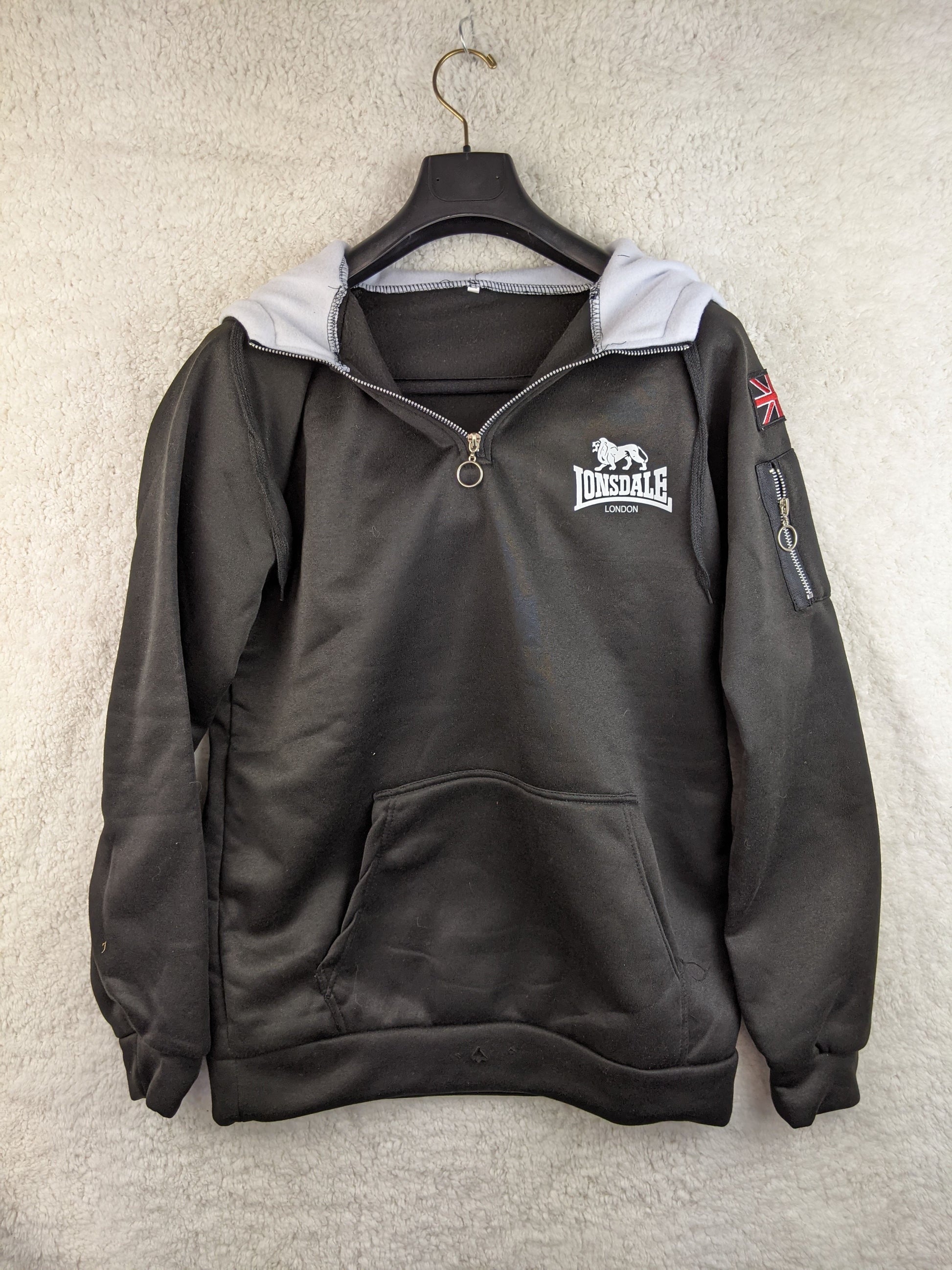 Front view of Lonsdale black hoodie with Union Jack detail