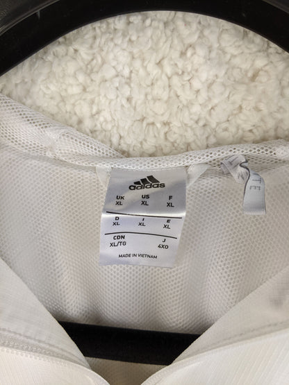 Size tag of Adidas AC Milan jacket showing XL