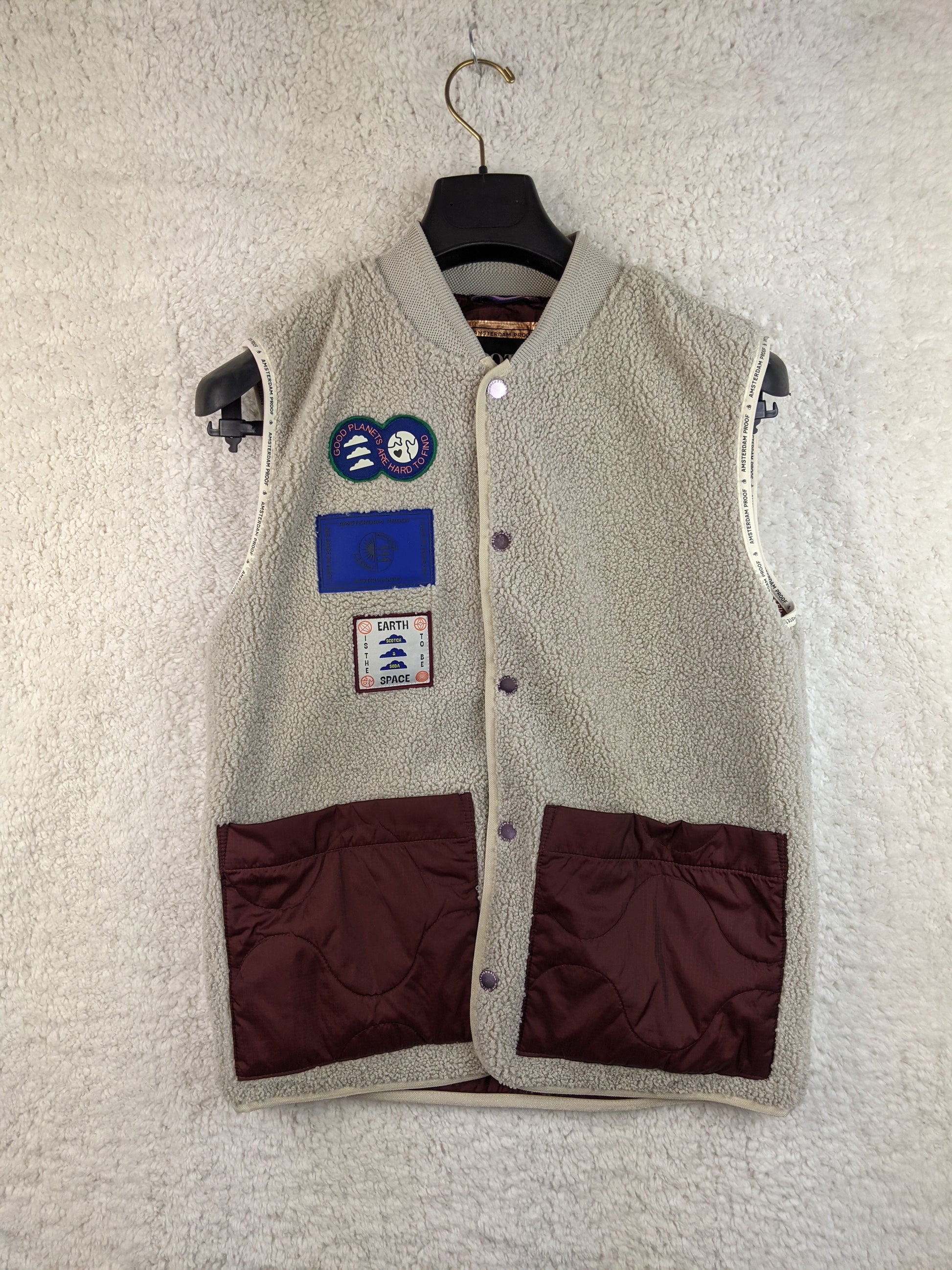 Front view of Scotch & Soda fleece vest with patches
