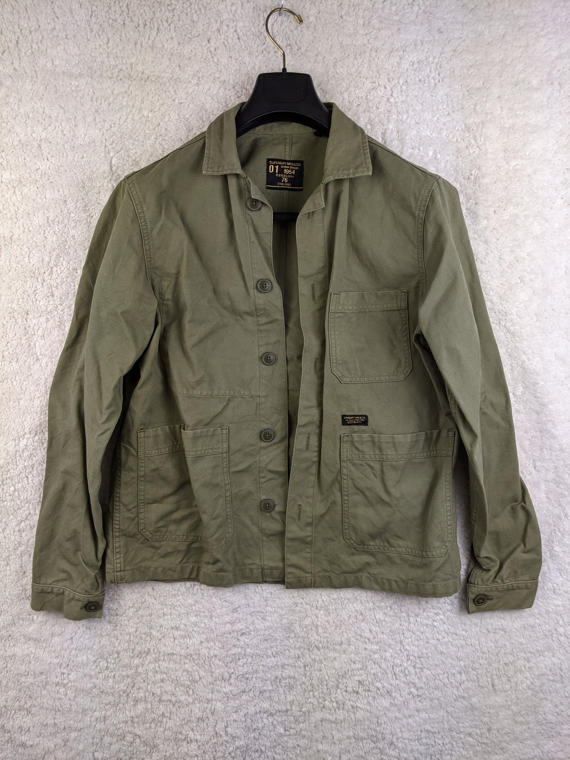 Front view of Superdry olive green workwear jacket