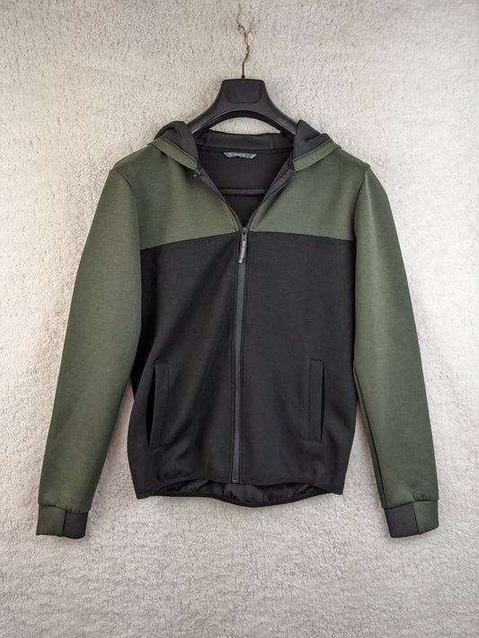 Front view of a green and black hoodie on a hanger