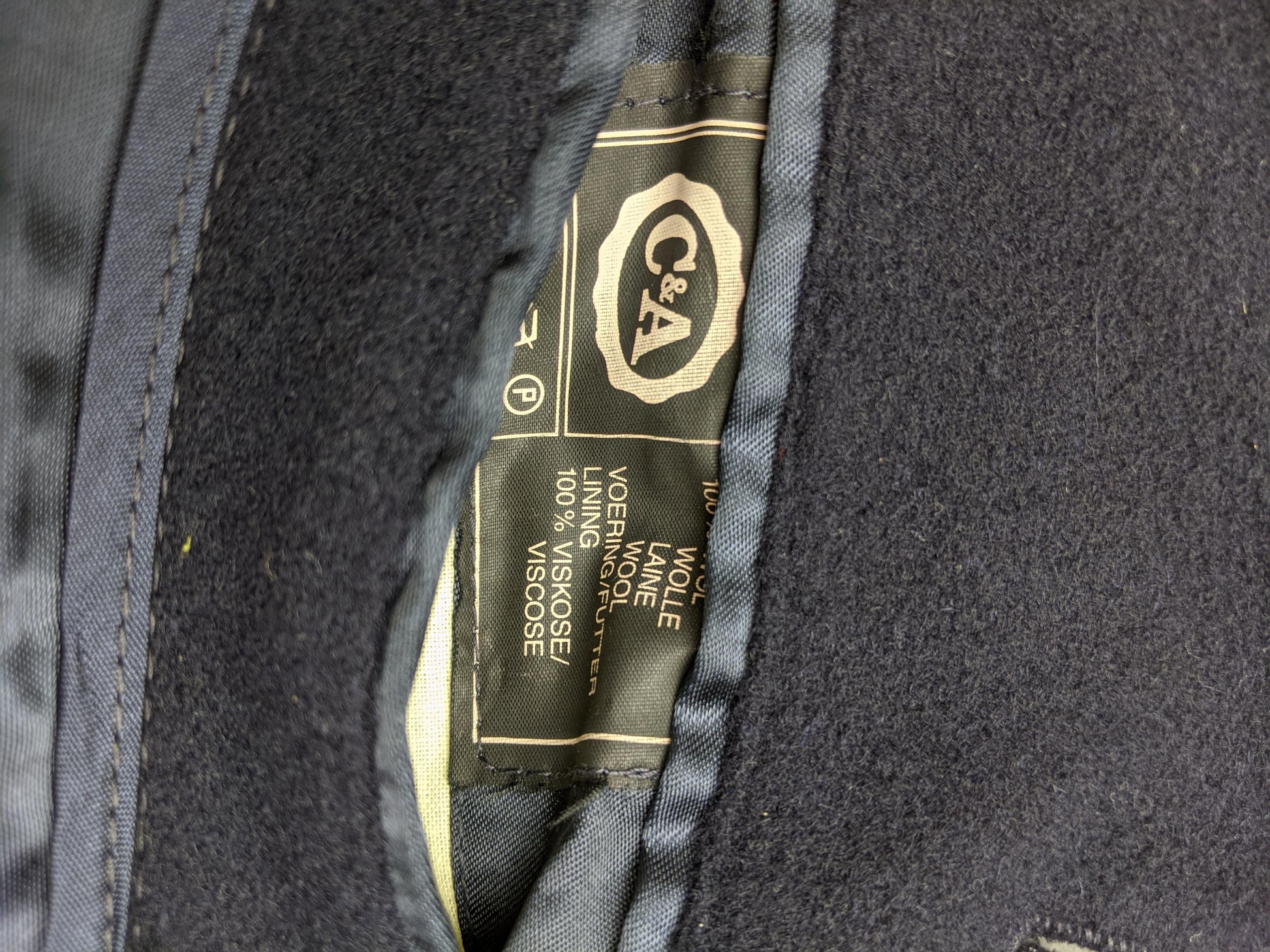 Label of C&A navy wool coat