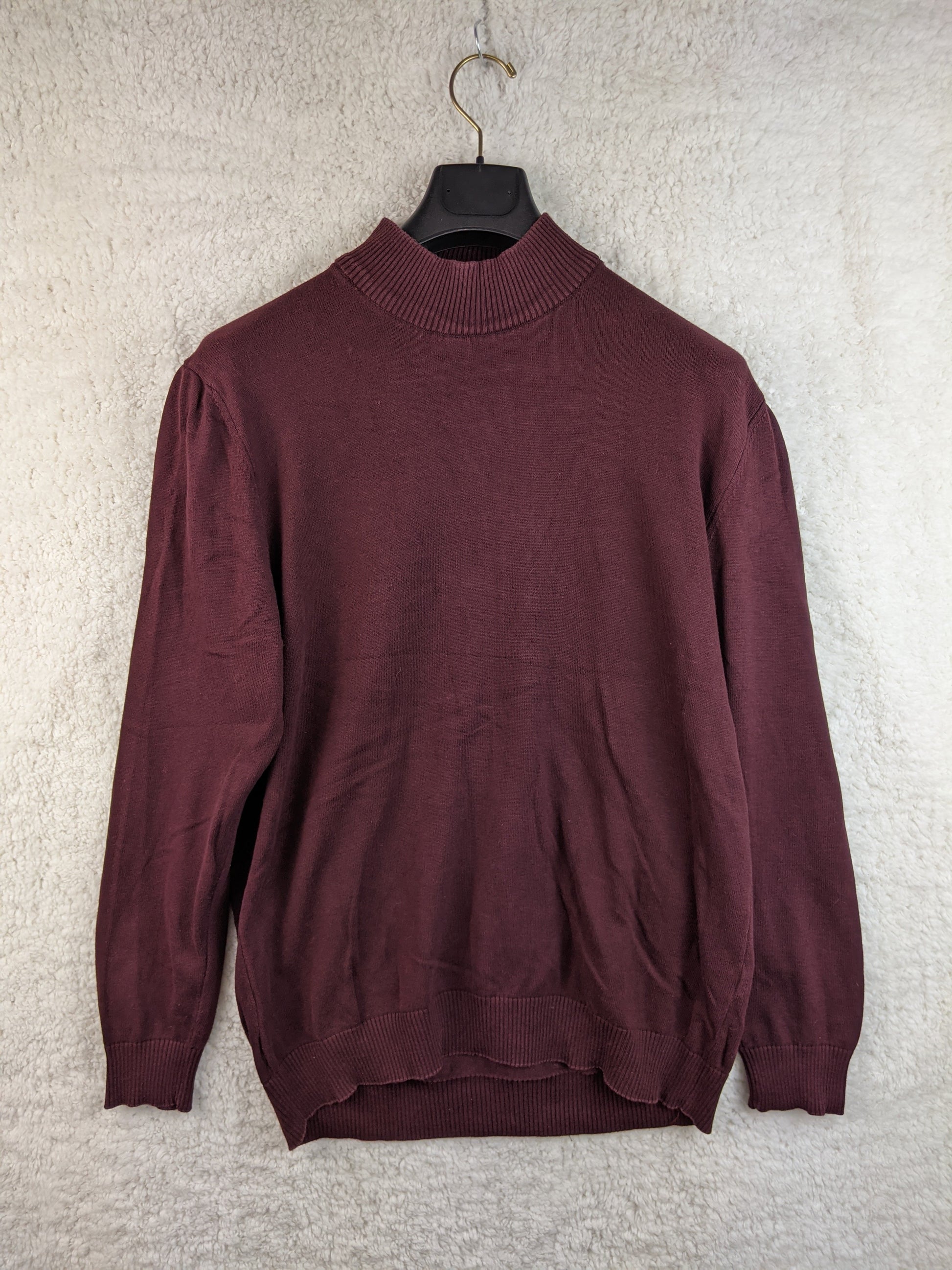 Front view of burgundy turtleneck sweater