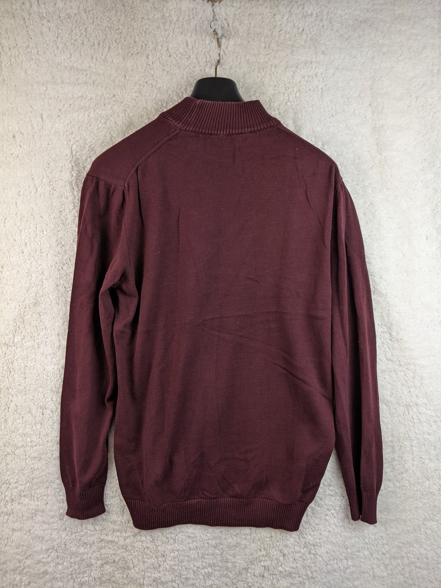 Back view of burgundy turtleneck sweater