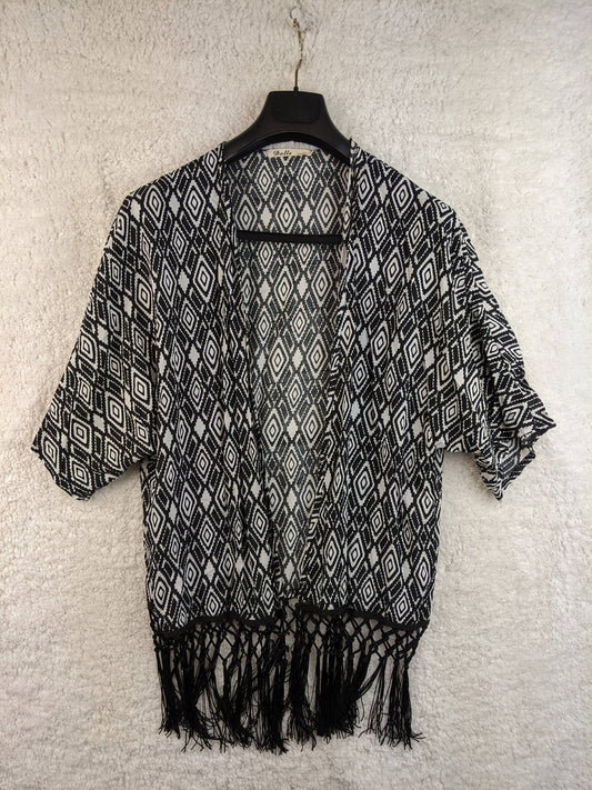 Front view of black and white patterned kimono