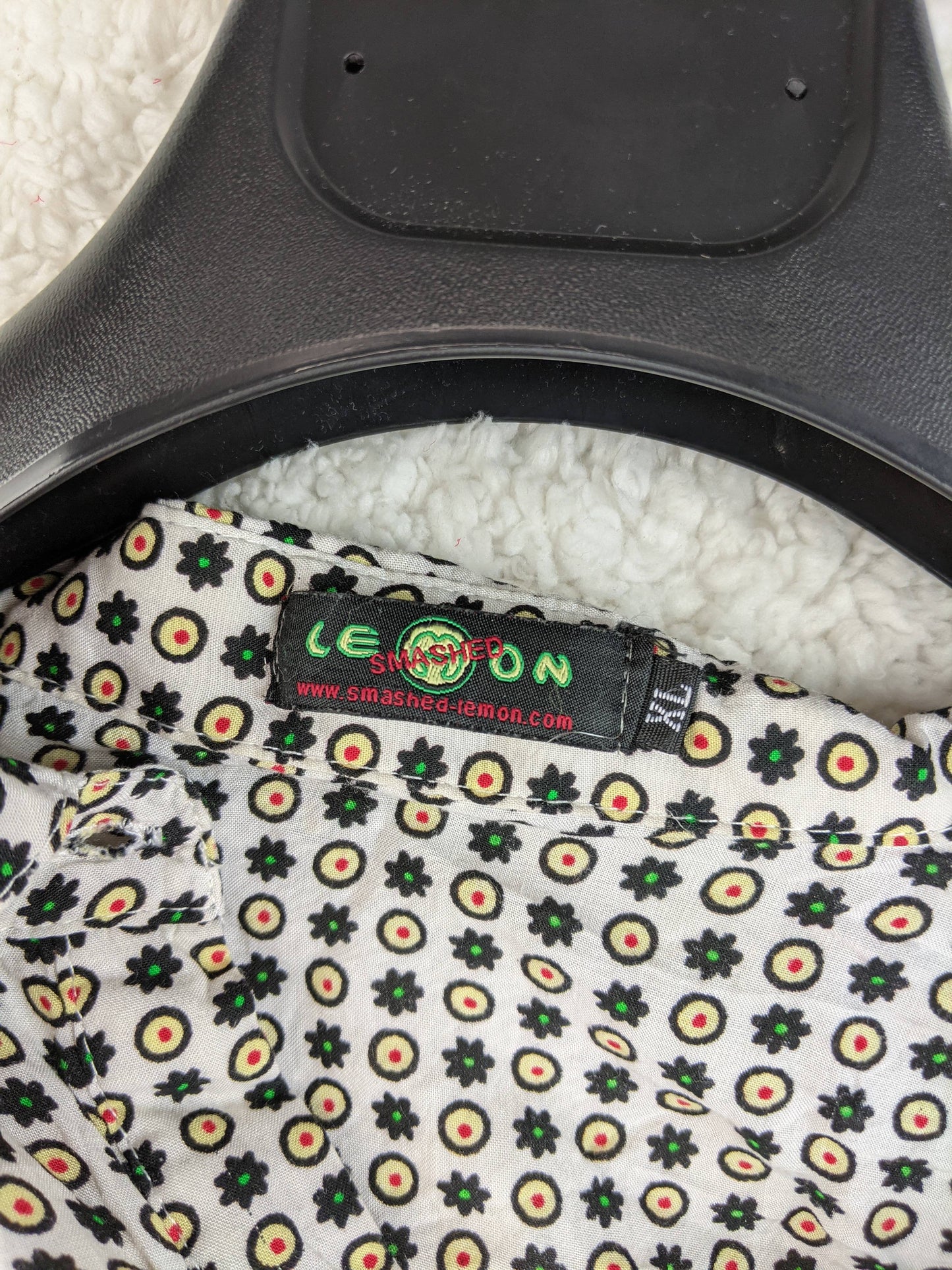 Close-up of Smashed Lemon label on blouse