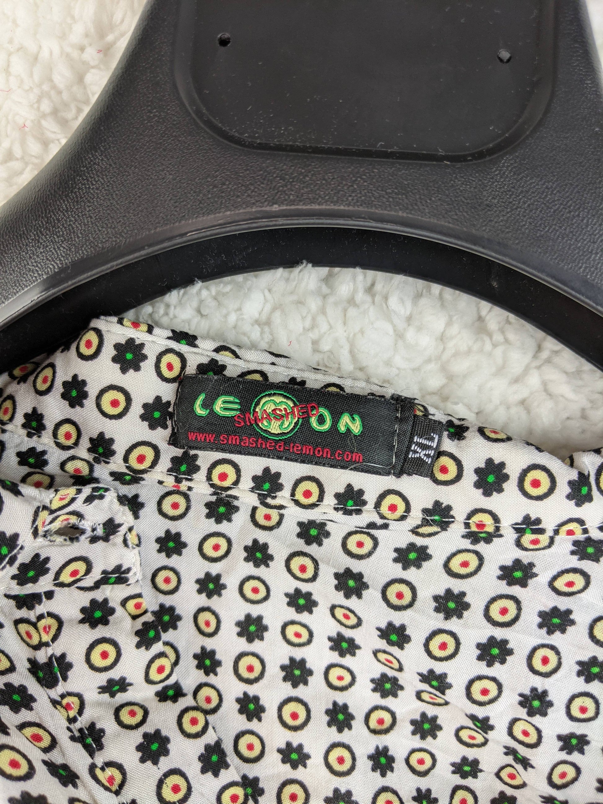 Close-up of Smashed Lemon label on blouse