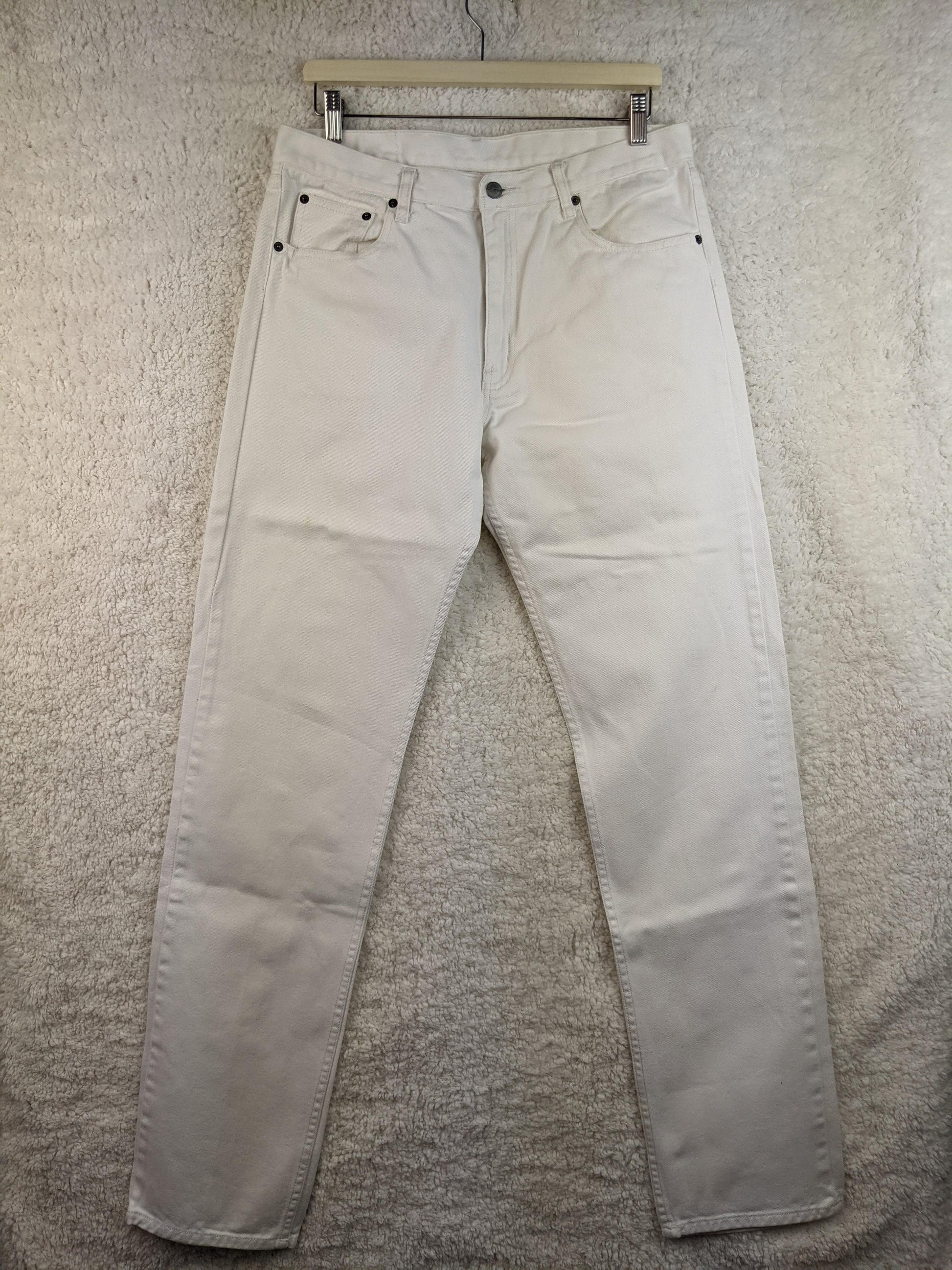 Front view of white denim jeans