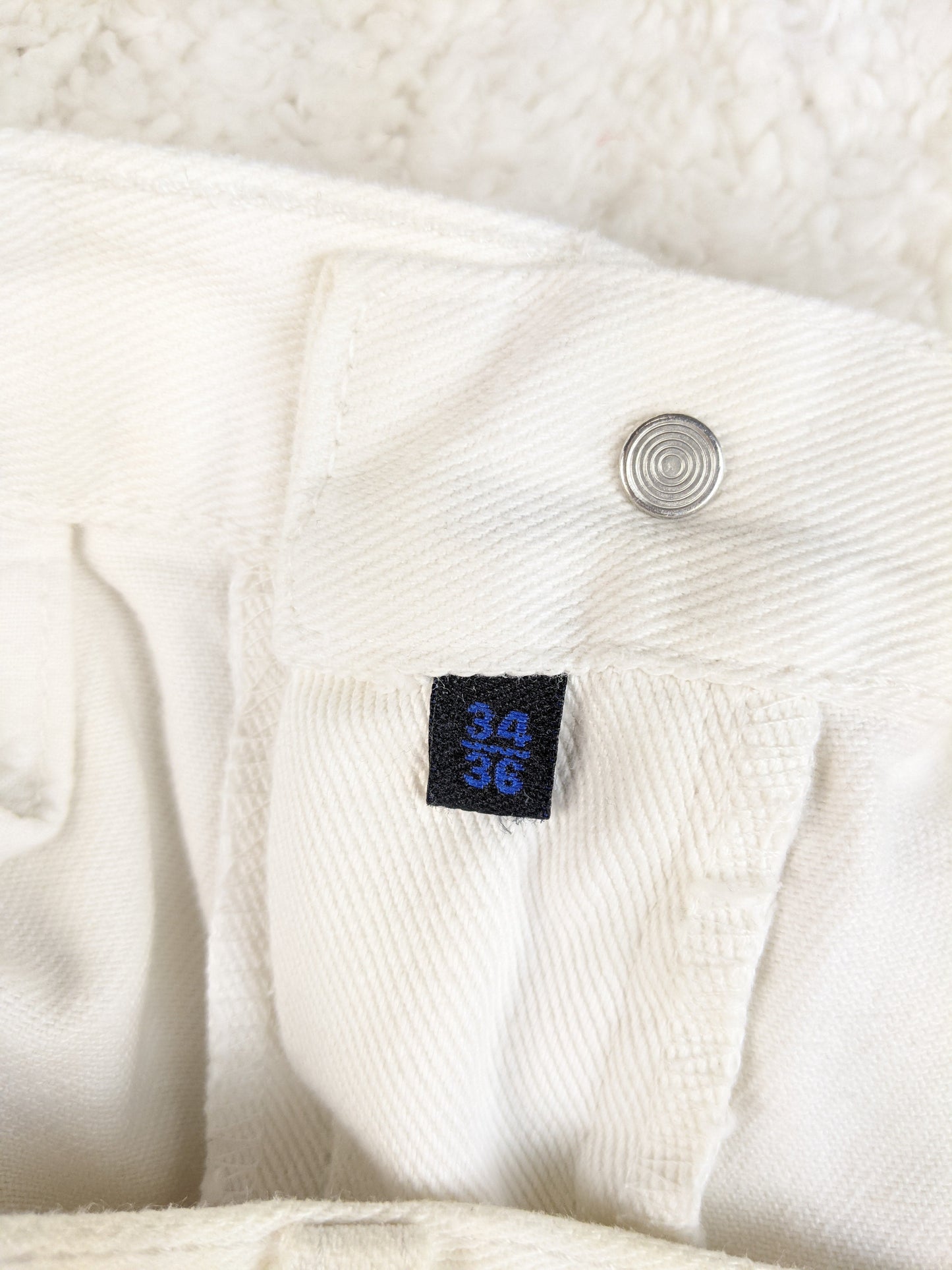 Size tag showing 34/36