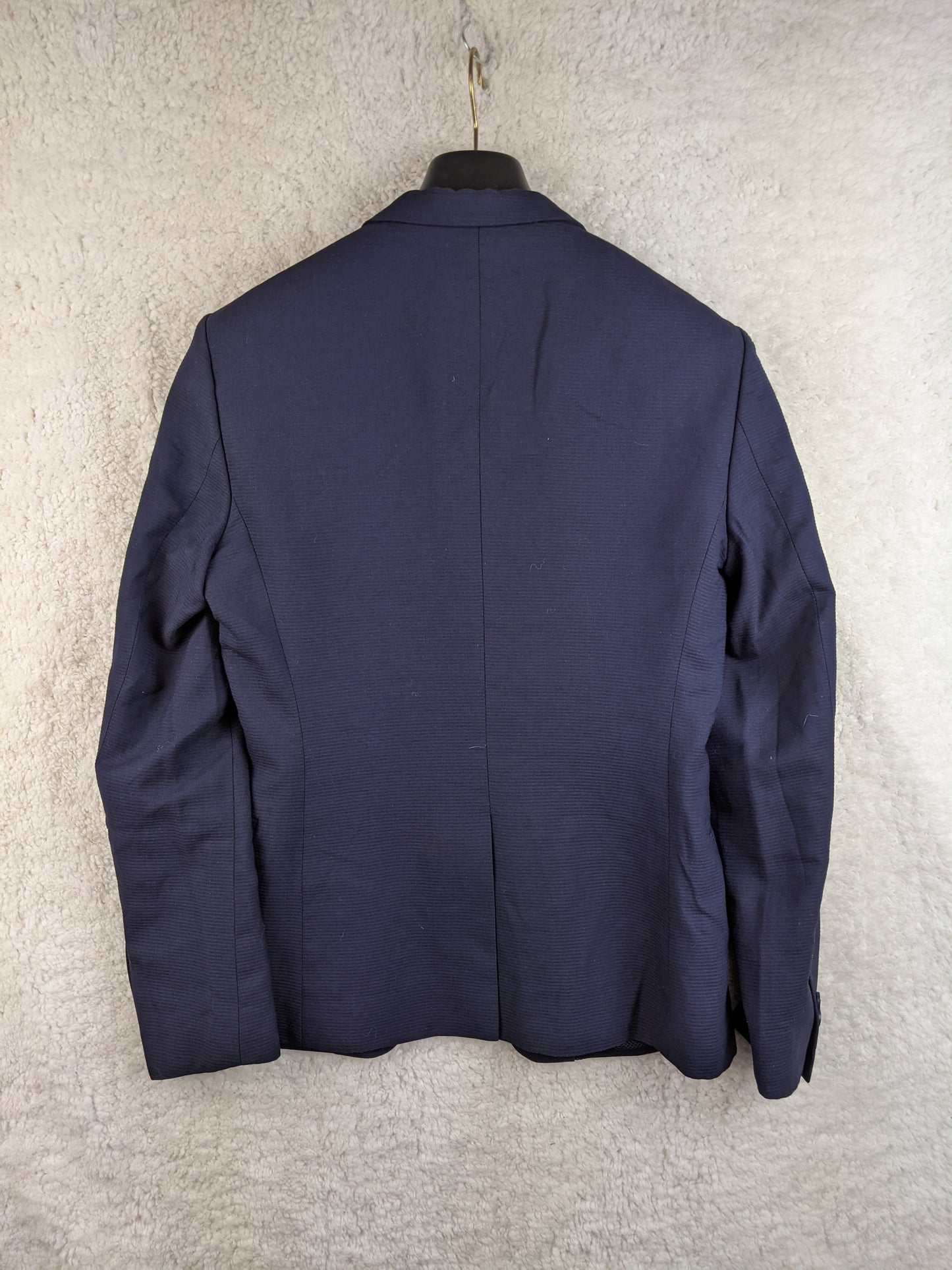 Back view of Zara Man navy blue blazer