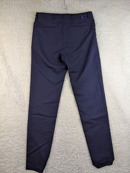 Back view of Zara Man navy chinos