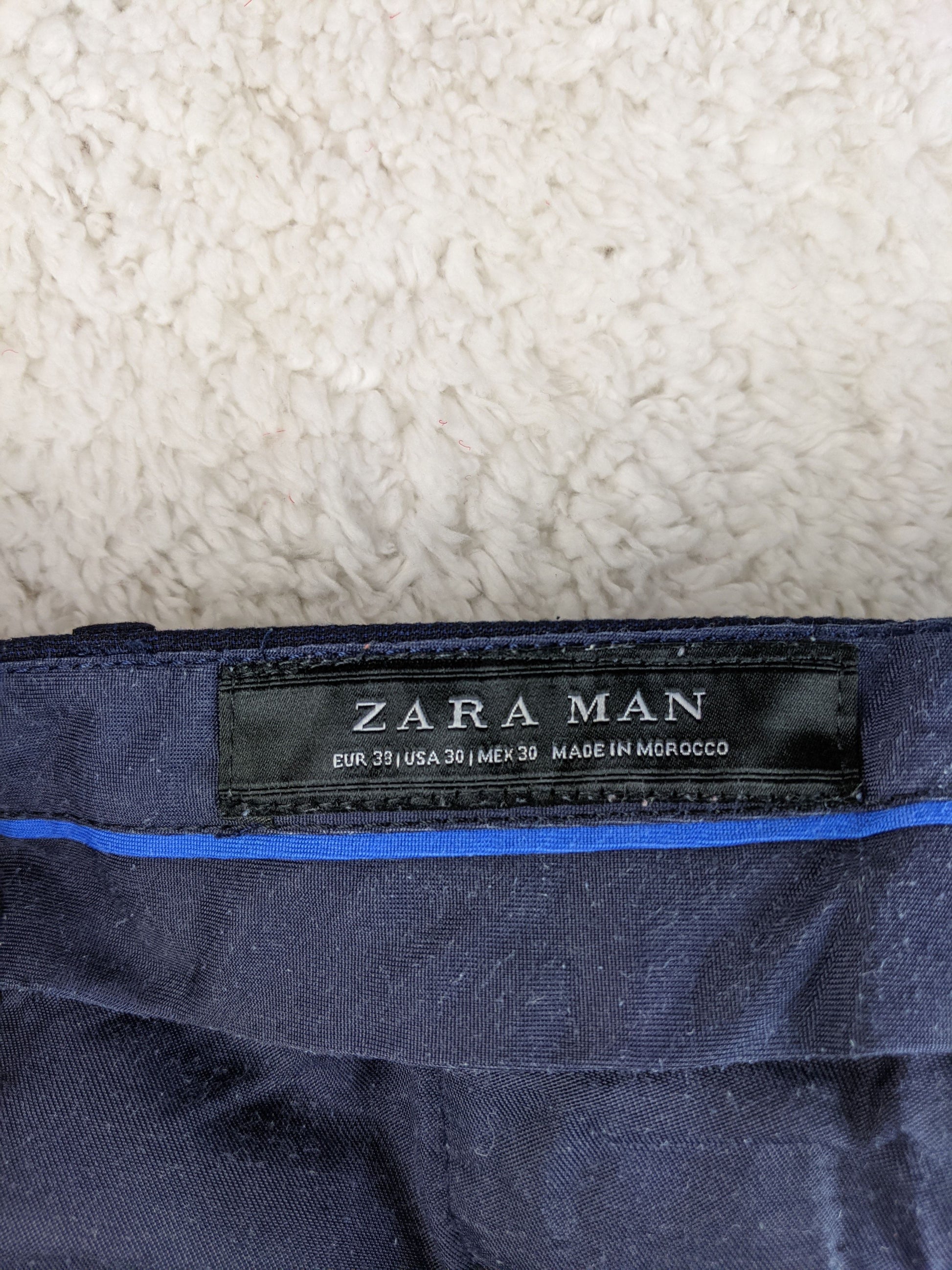 Label image of Zara Man chinos showing size and origin