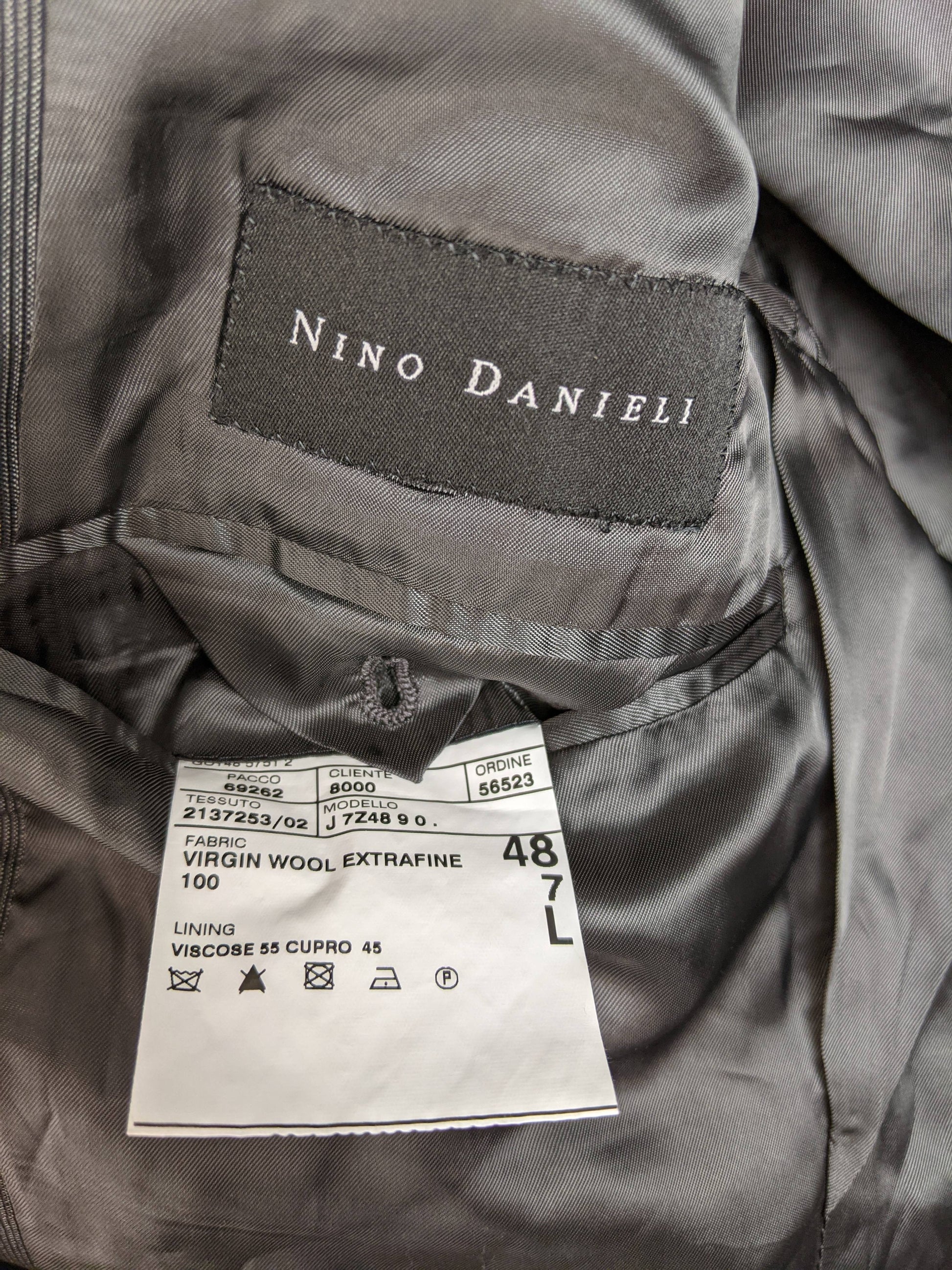 Label and material information for Nino Danieli blazer