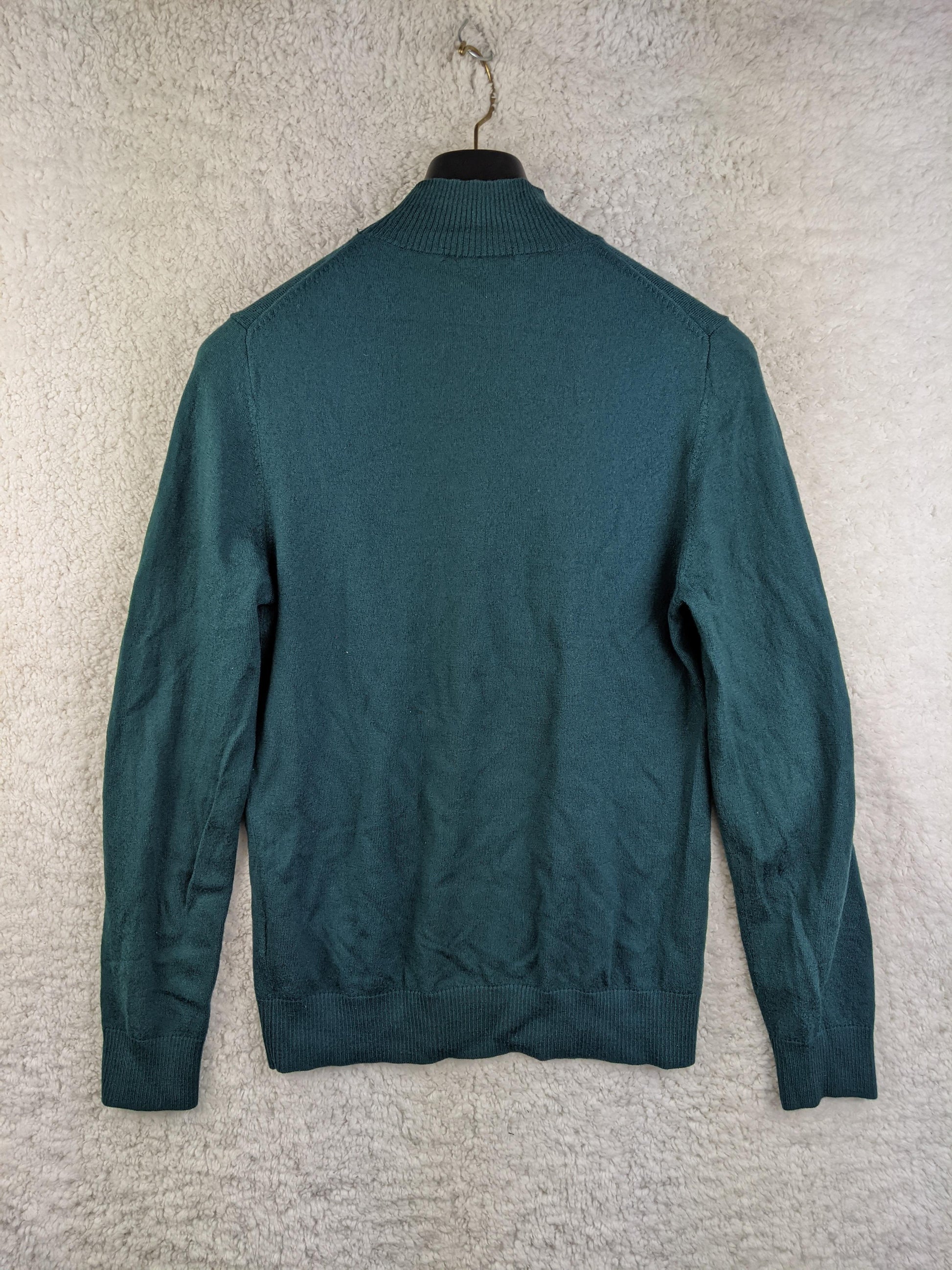 Green wool sweater back view