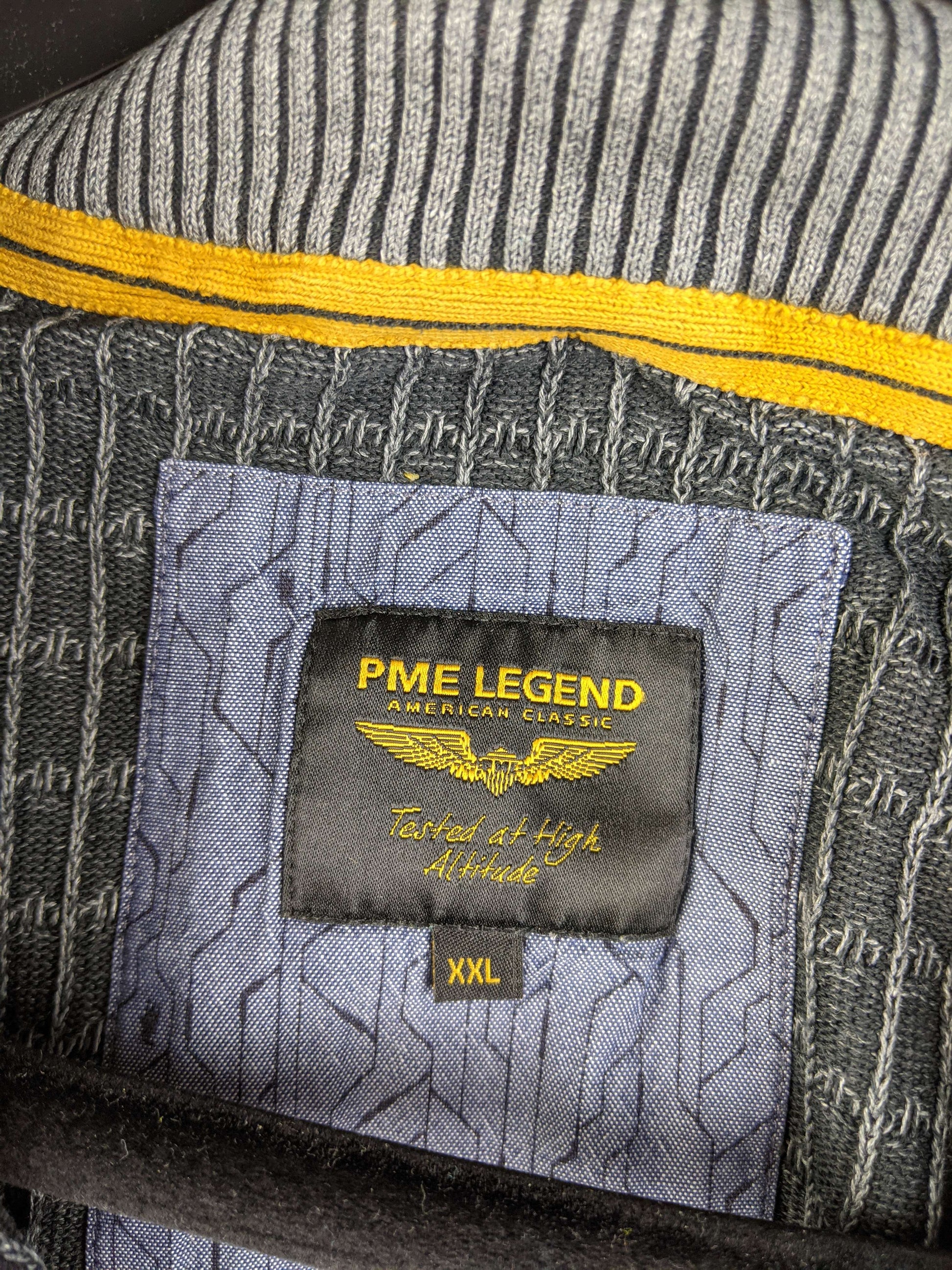 Close-up of PME Legend label on grey ribbed knit sweater
