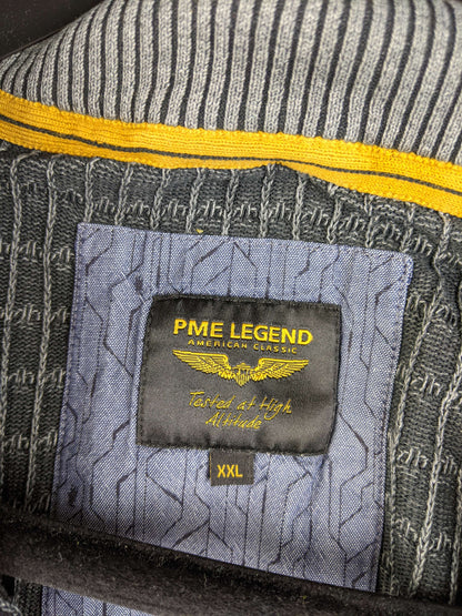 Close-up of PME Legend label on grey ribbed knit sweater