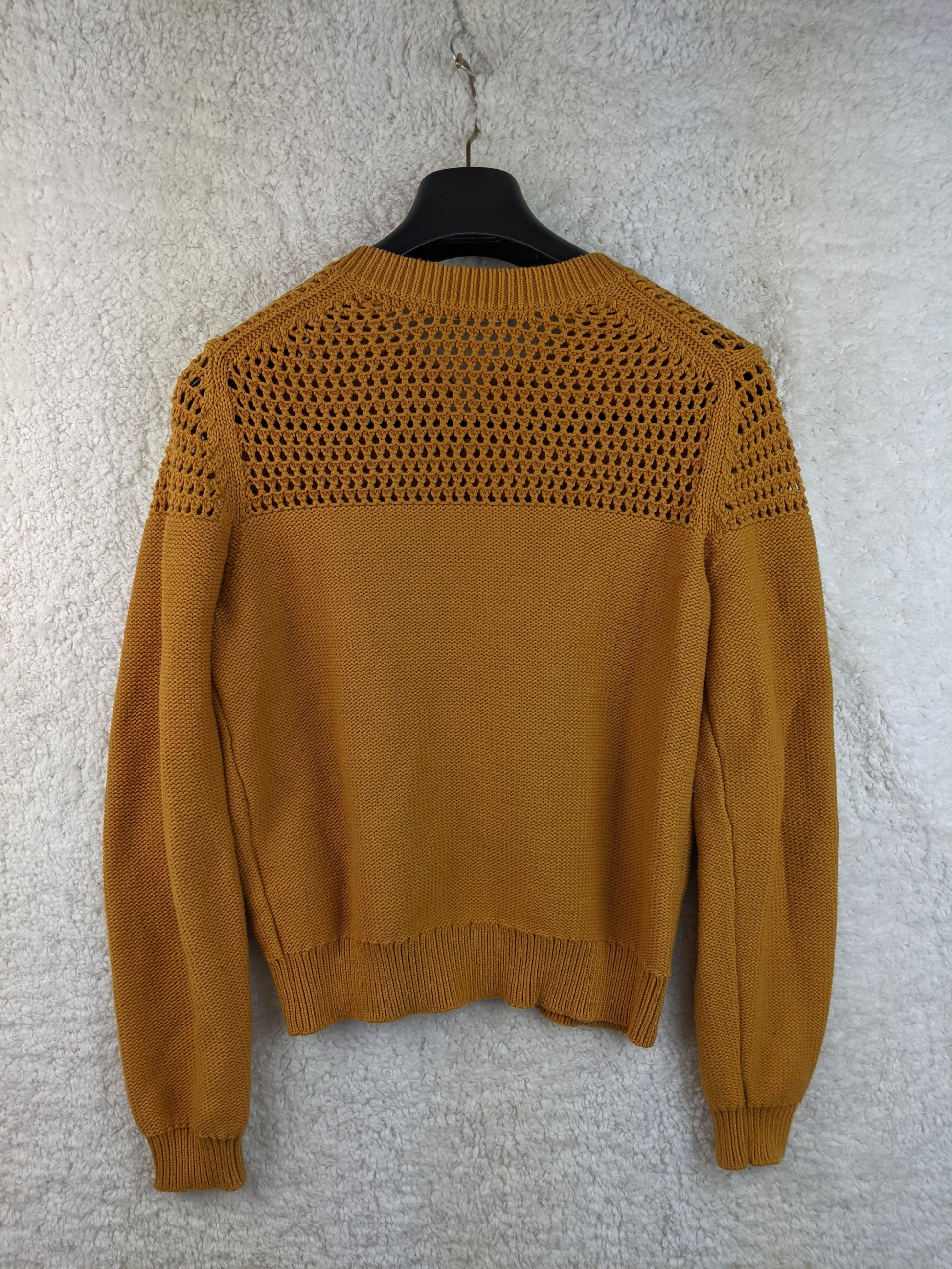 Back view of mustard Uniqlo U cardigan