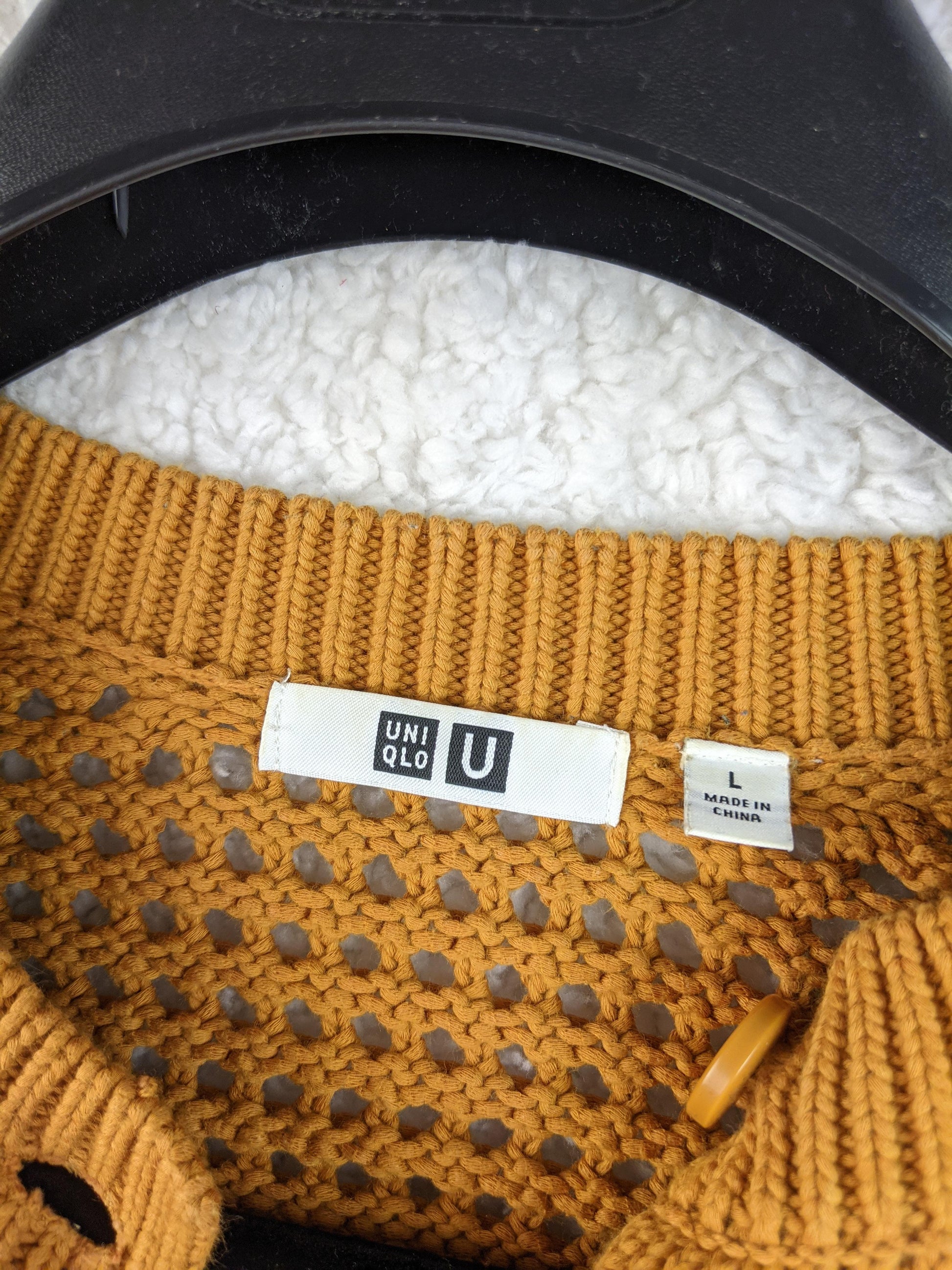 Label of Uniqlo U mustard cardigan