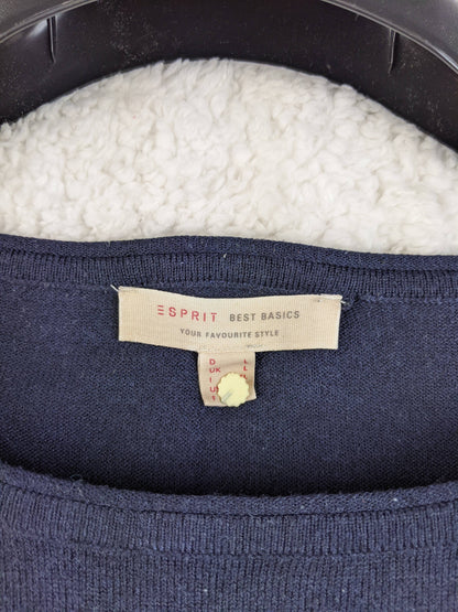 Close-up of the Esprit tag on the navy blue top